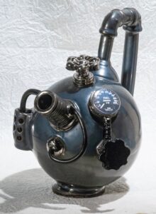 Robert Snyder Spherical - Wheel-thrown and hand-built porcelain, fired to cone 5 then luster fired with silver luster. perpetuitypottery.com